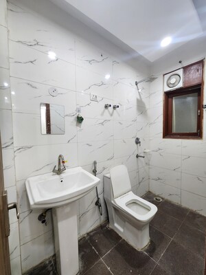 Bathroom in 2 BHK Builder Floor at Chattarpur – for Rent