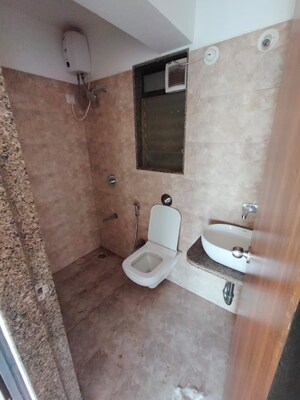 Bathroom in 1 BHK Apartment at Parinee Essence, Kandivali West – for Rent