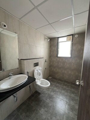 Bathroom in 3 BHK Apartment at Kundan Presidia, Nibm Road – for Rent