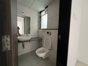 Bathroom in 3 BHK Apartment at Kundan The Peak, Nibm Road – for Rent