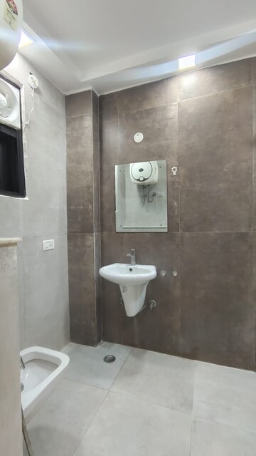 Bathroom in 3 BHK Builder Floor at Risland Sky Mansion, Chattarpur – for Rent