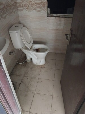 Bathroom in 1 BHK Apartment at Nilaya Greens, Raj Nagar Extension – for Rent