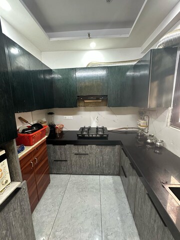 Kitchen in 2 BHK Apartment at Nilaya Greens, Raj Nagar Extension – for Rent