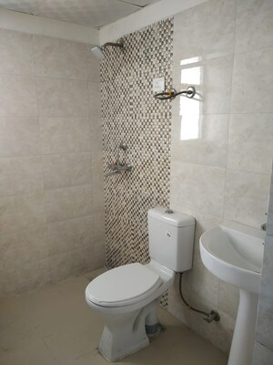 Bathroom in 1 BHK Apartment at Mehak Jeevan, Raj Nagar Extension – for Rent
