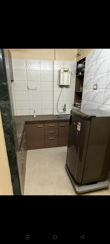 Kitchen in 2 BHK Apartment at Yashraj Park CHS, Kasarvadavali – for Sale