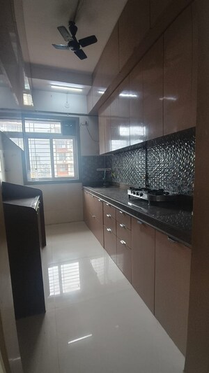 Kitchen in 2 BHK Apartment at Aditya Plaza Malad, Malad West – for Rent