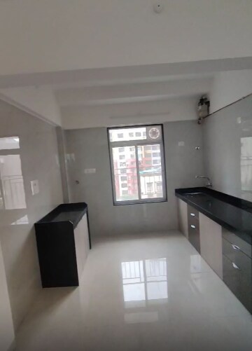 Kitchen in 2 BHK Apartment at Silver Coin Apartment, Malad West – for Rent