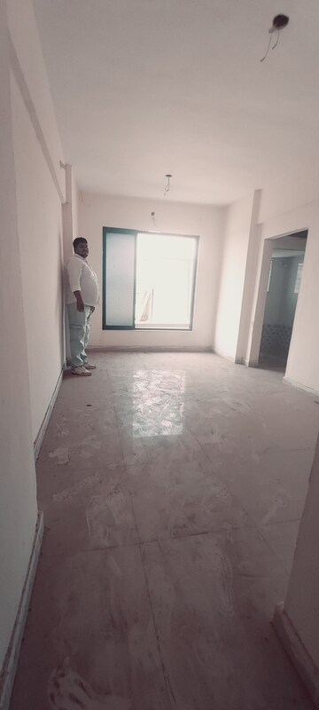 Living Room in 1 BHK Apartment at Kalwa – for Sale