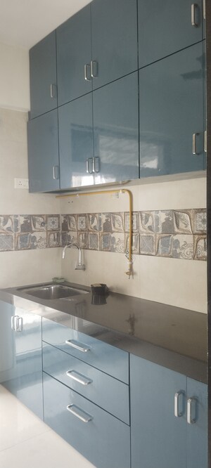 Kitchen in 2 BHK Apartment at Galaxy Greenwoods, Kharghar – for Sale