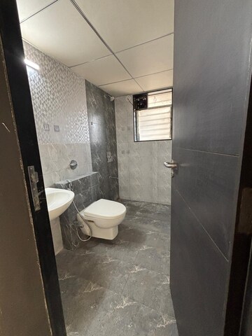 Bathroom in 2 BHK Apartment at Paranjape Azure, Tathawade – for Rent