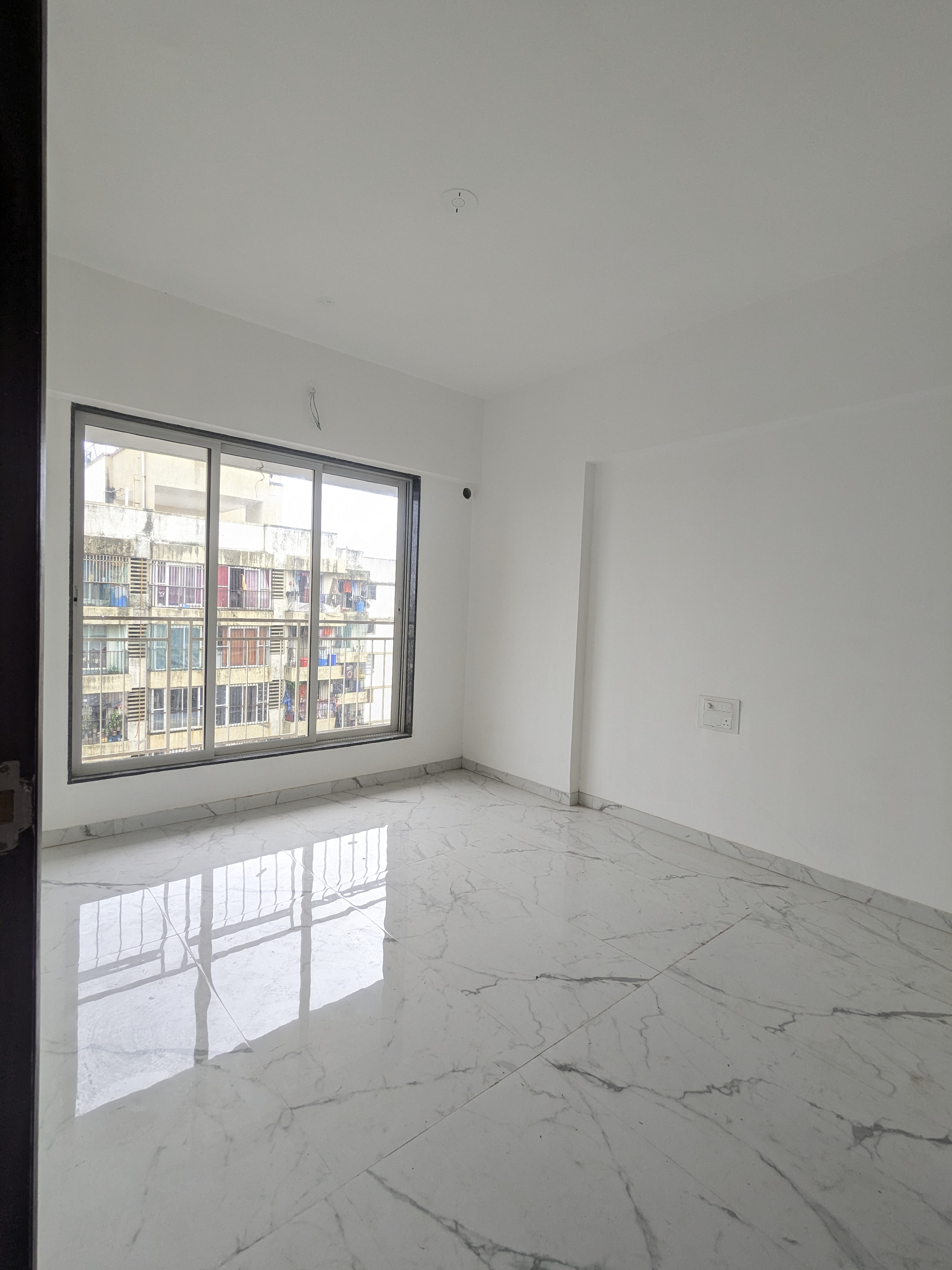 Room in 1 BHK Apartment at Dharti Pressidio, Kandivali West – for Sale
