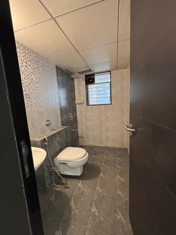 Bathroom in 3 BHK Apartment at Paranjape Azure, Tathawade – for Rent