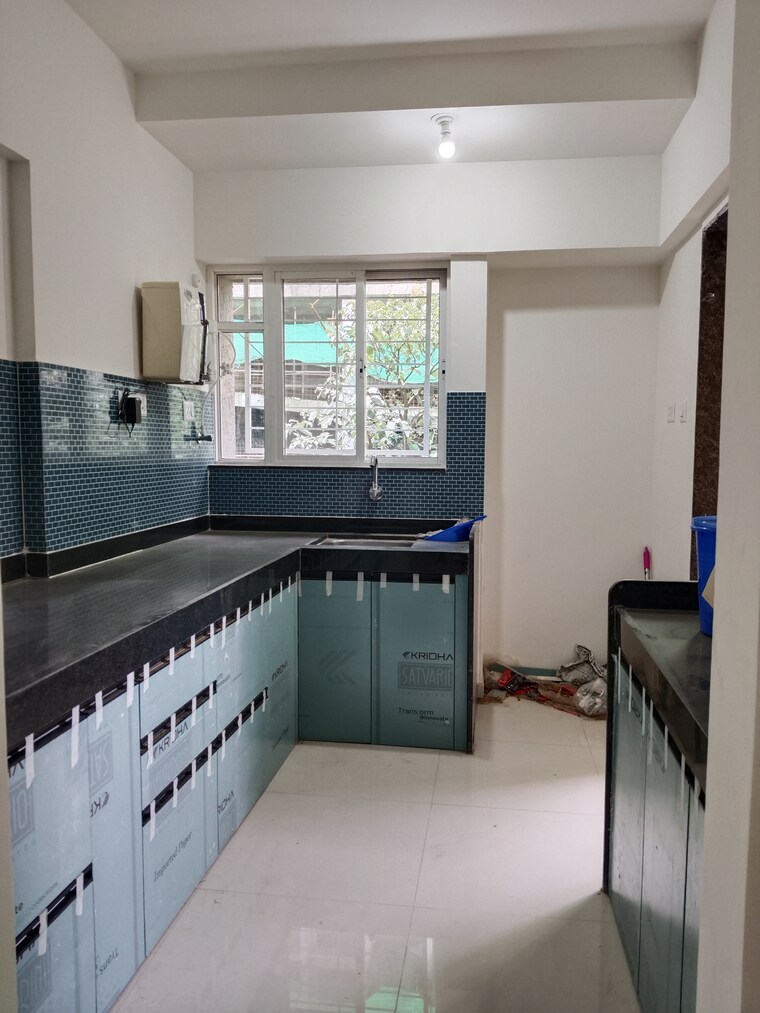Kitchen, newton-homes-tathawade 2 Bedroom 815 Sq.Ft. Apartment In Tathawade Pune 9257566
