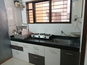 Kitchen in 2 BHK Apartment at Magarpatta Jasminium, Hadapsar – for Rent