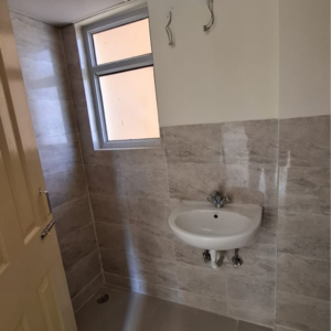 Bathroom in 2 BHK Apartment at Wave Dream Homes, Ram Nagar – for Rent