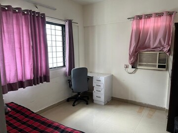 Living Room in 2 BHK Apartment at Magarpatta City Iris, Hadapsar – for Rent