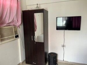 Living Room in 2 BHK Apartment at Magarpatta City Iris, Hadapsar – for Rent