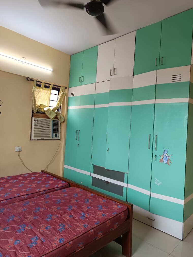 Bedroom, magarpatta-city-cosmos 2 Bedroom 980 Sq.Ft. Apartment In Magarpatta Road Pune 9257736