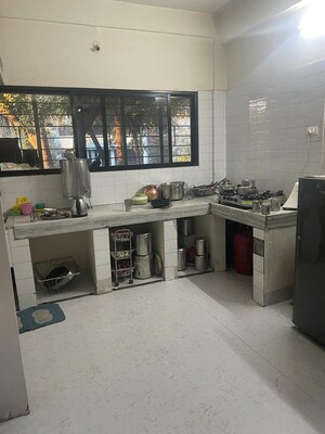 Kitchen in 2 BHK Apartment at Soba Puram Apartments, Warje – for Rent