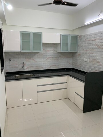 Kitchen in 2 BHK Apartment at Wadhwani Sai Paradise, Punawale – for Rent