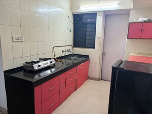 Kitchen in 2 BHK Apartment at Magarpatta City Cosmos, Magarpatta Road – for Rent