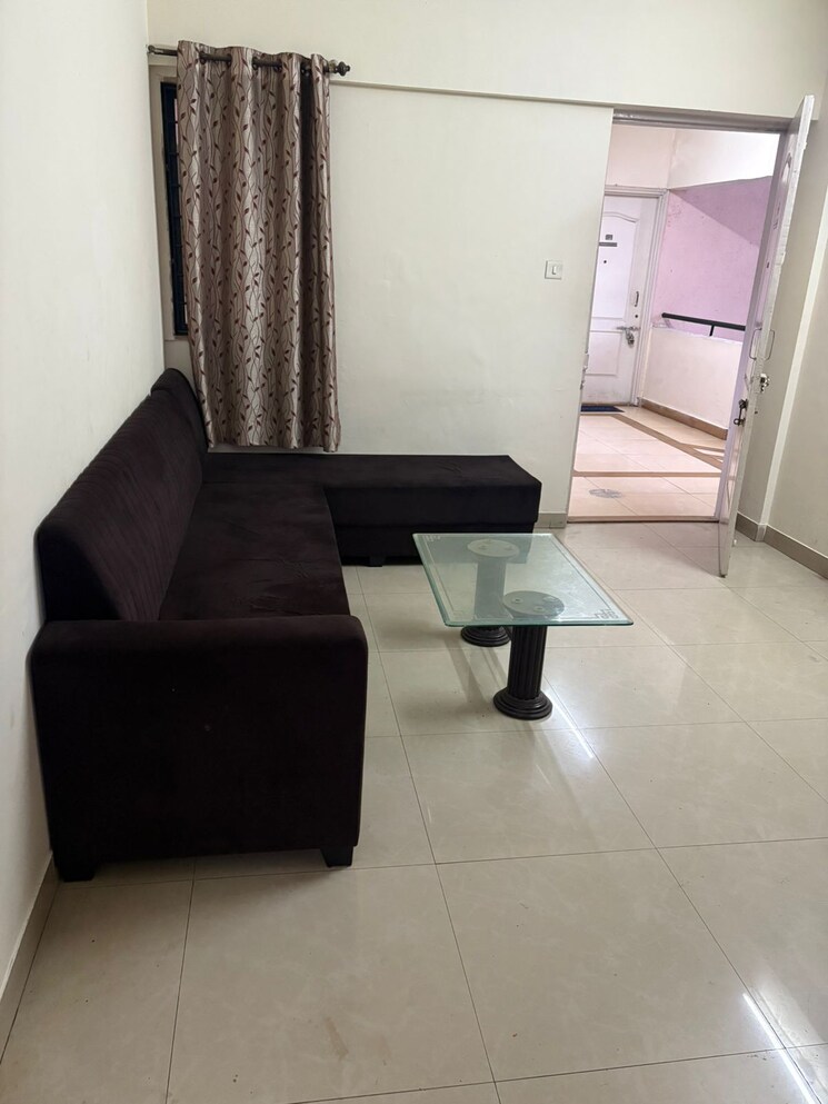 Living Room, magarpatta-city-cosmos 2 Bedroom 980 Sq.Ft. Apartment In Magarpatta Road Pune 9257768