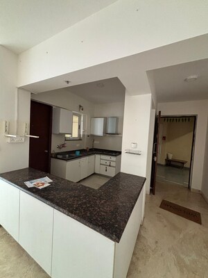 Kitchen in 2 BHK Apartment at Marvel Azure, Hadapsar – for Rent