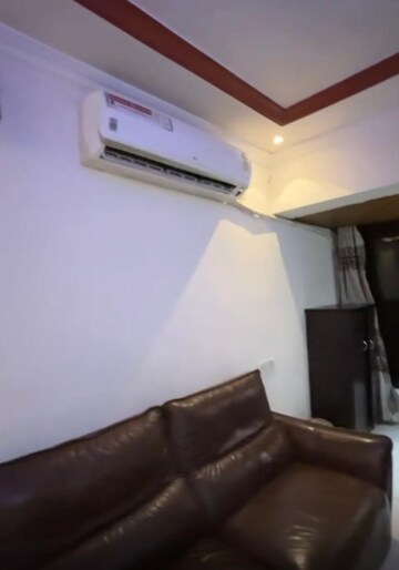 Living Room in 1 BHK Apartment at Evershine CHS Malad, Malad West – for Rent