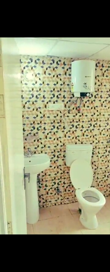 Bathroom in 1 BHK Apartment at Nilaya Greens, Raj Nagar Extension – for Rent
