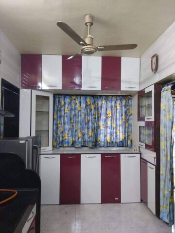 Kitchen in 2 BHK Apartment at Magarpatta Grevillea, Hadapsar – for Rent