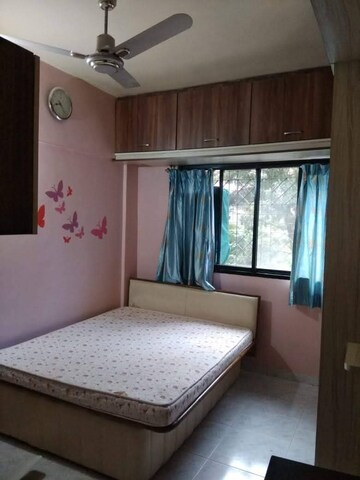 Bedroom in 2 BHK Apartment at Magarpatta Grevillea, Hadapsar – for Rent