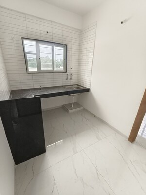 Kitchen in 1 BHK Apartment at Wadgaon Sheri – for Rent