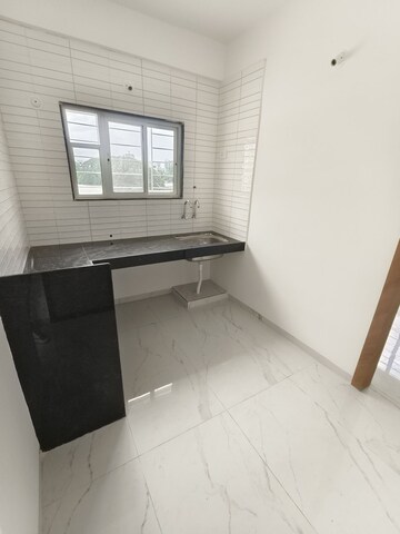 Kitchen in 1 BHK Apartment at Wadgaon Sheri – for Rent
