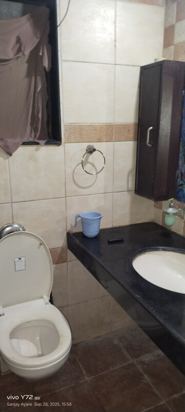 Bathroom in 2 BHK Apartment at Globe Heights, Goregaon East – for Rent