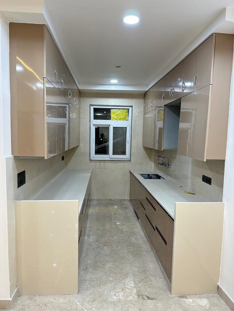 Kitchen, ganga-triveni-apartment 3 Bedroom 1300 Sq.Ft. Apartment In Rohini Sector 9 Delhi 9258168