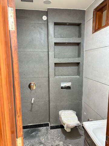 Attached Bathroom in 3 BHK Apartment at Ganga Triveni Apartment, Rohini Sector 9 – for Sale