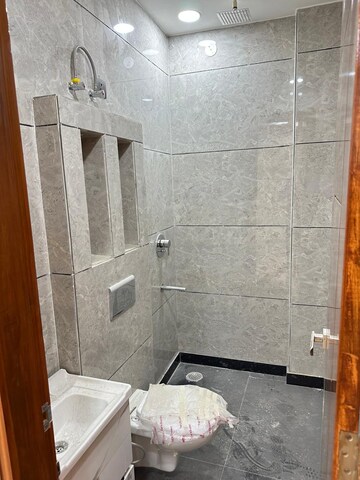Bathroom in 3 BHK Apartment at Ganga Triveni Apartment, Rohini Sector 9 – for Sale