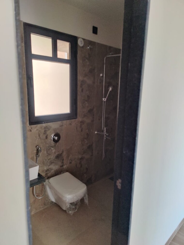 Bathroom, vtp-aethereus 2 Bedroom 662 Sq.Ft. Apartment In Mahalunge Pune 9258402