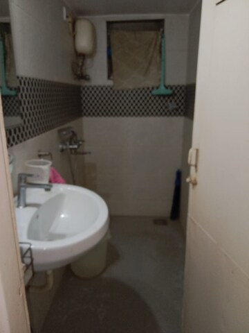 Bathroom in 2 BHK Apartment at Arunodaya CHS, Andheri East – for Rent