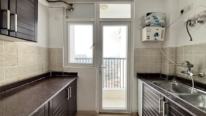 Kitchen in 3 BHK Apartment at Gulmohur Garden, Raj Nagar Extension – for Sale