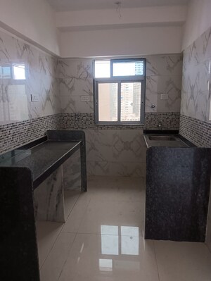 Kitchen in 1 BHK Apartment at DGS Sheetal Tapovan, Malad East – for Sale