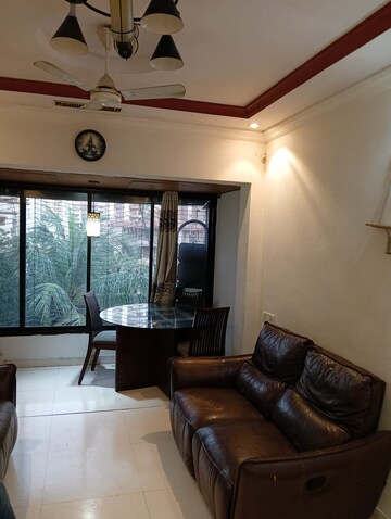 Living Room in 1 BHK Apartment at Nalanda CHS Malad , Malad West – for Rent