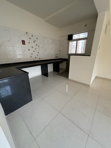 Kitchen in 3 BHK Apartment at Jhamtani Vision Ace Phase 1, Tathawade – for Rent