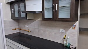 Kitchen in 2 BHK Apartment at Godrej Garden City, Jagatpur – for Rent