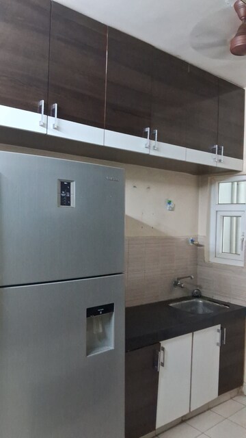 Kitchen in 2 BHK Apartment at Godrej Garden City, Jagatpur – for Rent