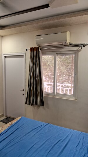 Room in 2 BHK Apartment at Godrej Garden City, Jagatpur – for Rent