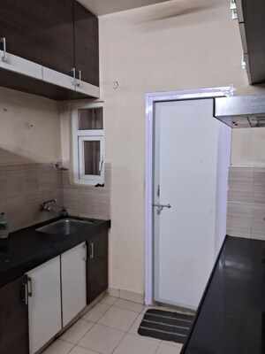 Kitchen in 2 BHK Apartment at Godrej Garden City, Jagatpur – for Rent