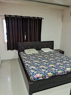 Bedroom in 2 BHK Apartment at Godrej Garden City, Jagatpur – for Rent