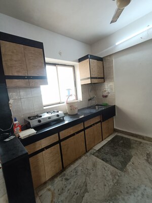 Kitchen in 2 BHK Apartment at Mandar Apartments, Andheri West – for Rent