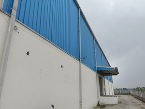  Warehouse – Exterior View View at Industrial Area - for Rent